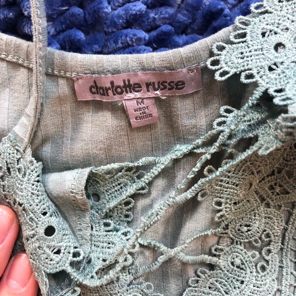 Green low cut laced body suit